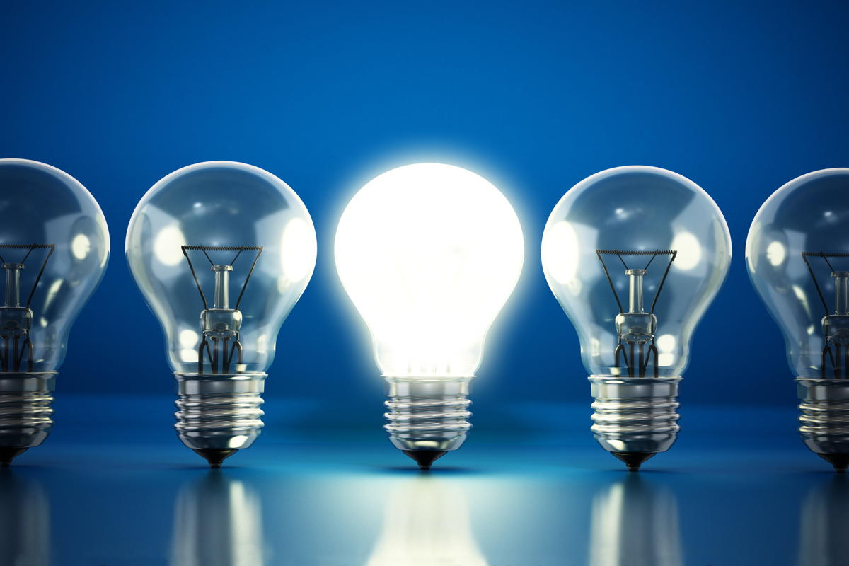 One lit bulb among unlit ones.